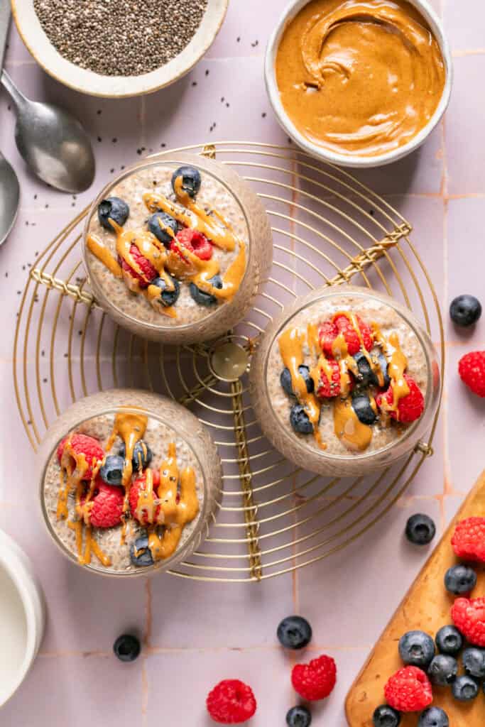 almond butter chia pudding in small glasses