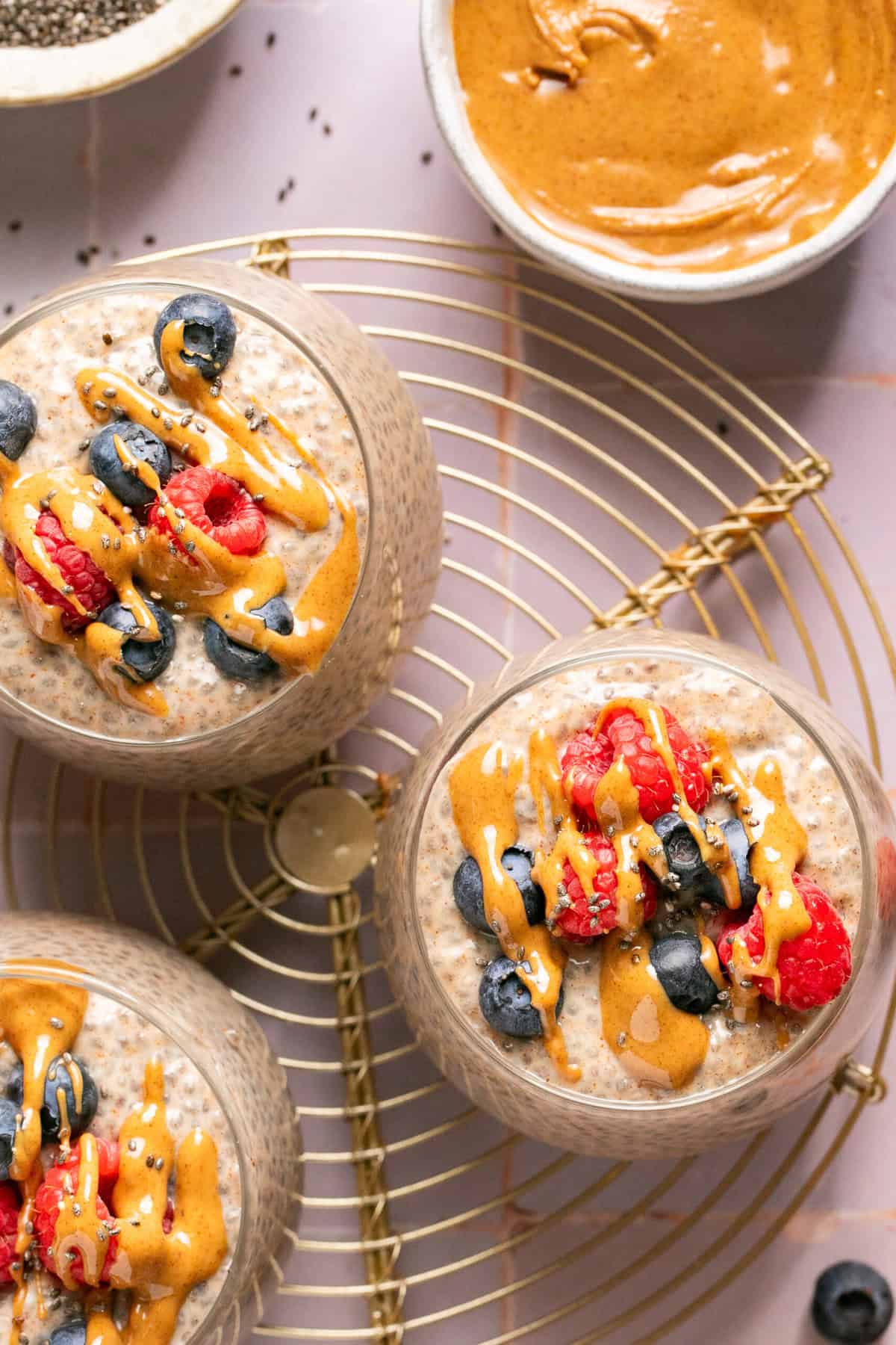 almond butter chia pudding in small glasses