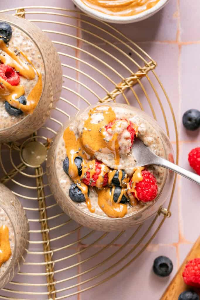 chia pudding with spoon and toppings