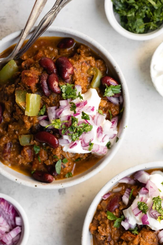 pumpkin chili in white bowls