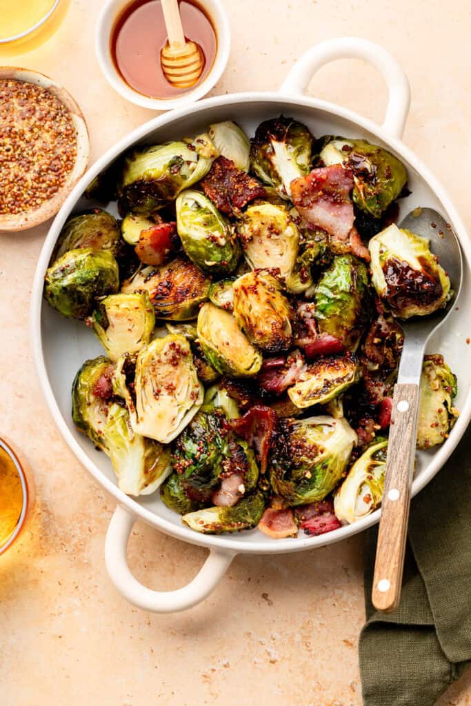 roasted brussels sprouts in bowl with spoon