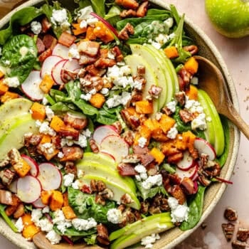 salad in serving bowl with serving spoon