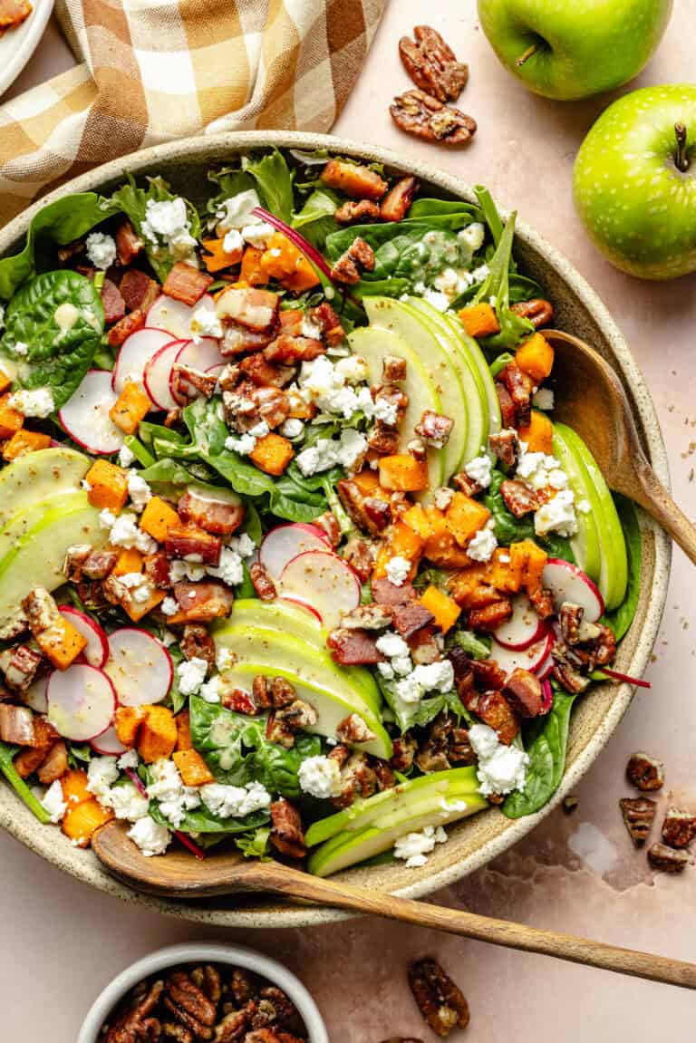 salad in serving bowl with serving spoon