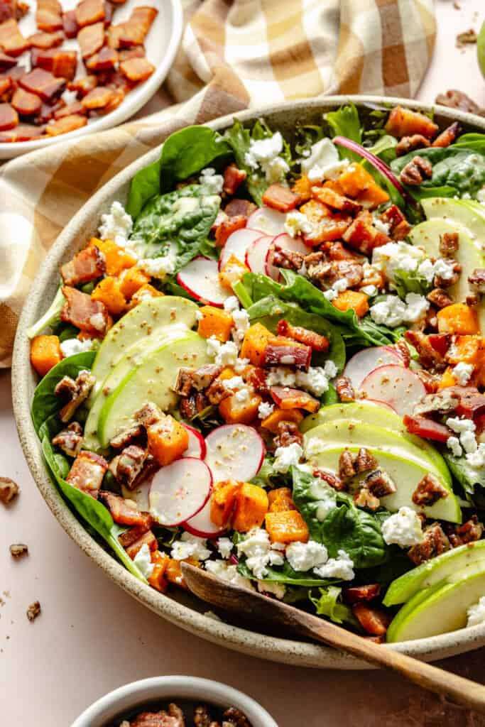 salad in serving bowl with serving spoon