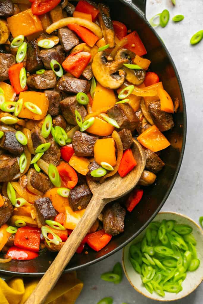 steak and veggies in skillet