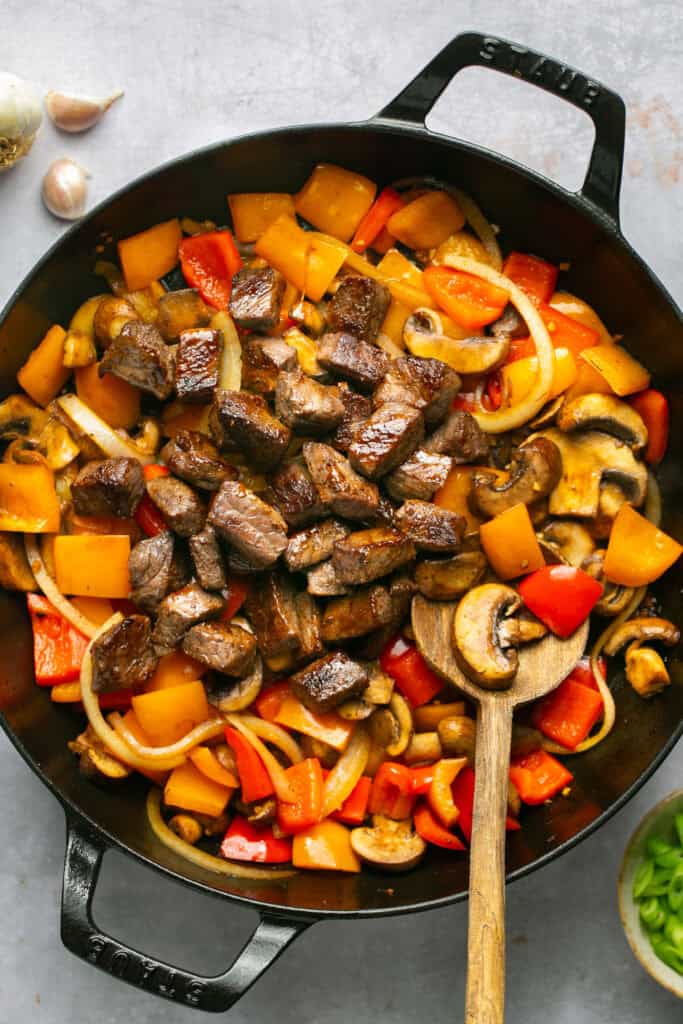 beef and veggies in skillet 