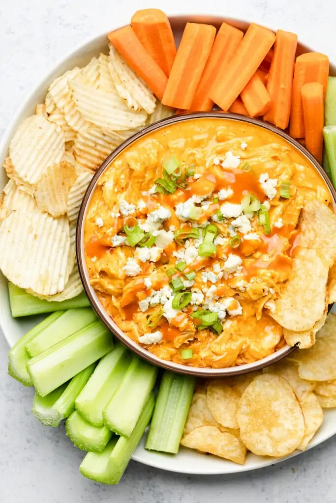 healthy buffalo chicken dip with veggies and chips