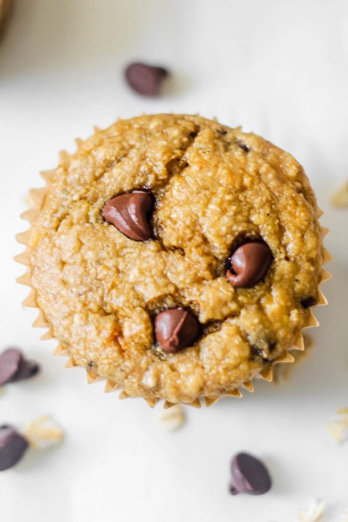 banana chocolate chip muffin on white background