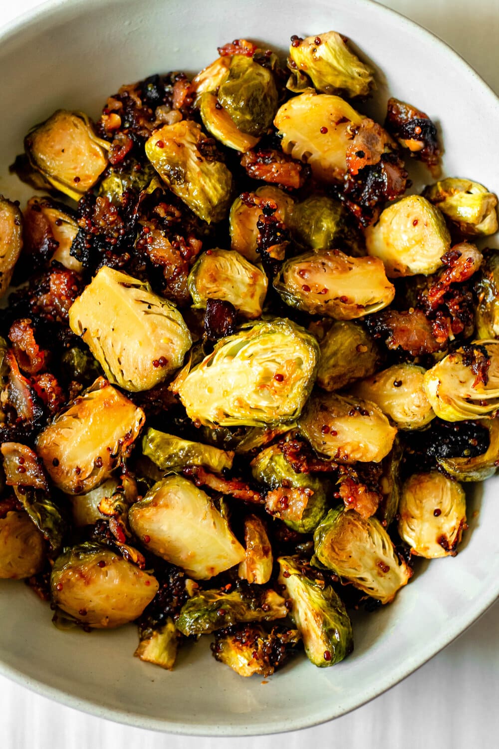 Roasted Brussels sprouts in a white bowl