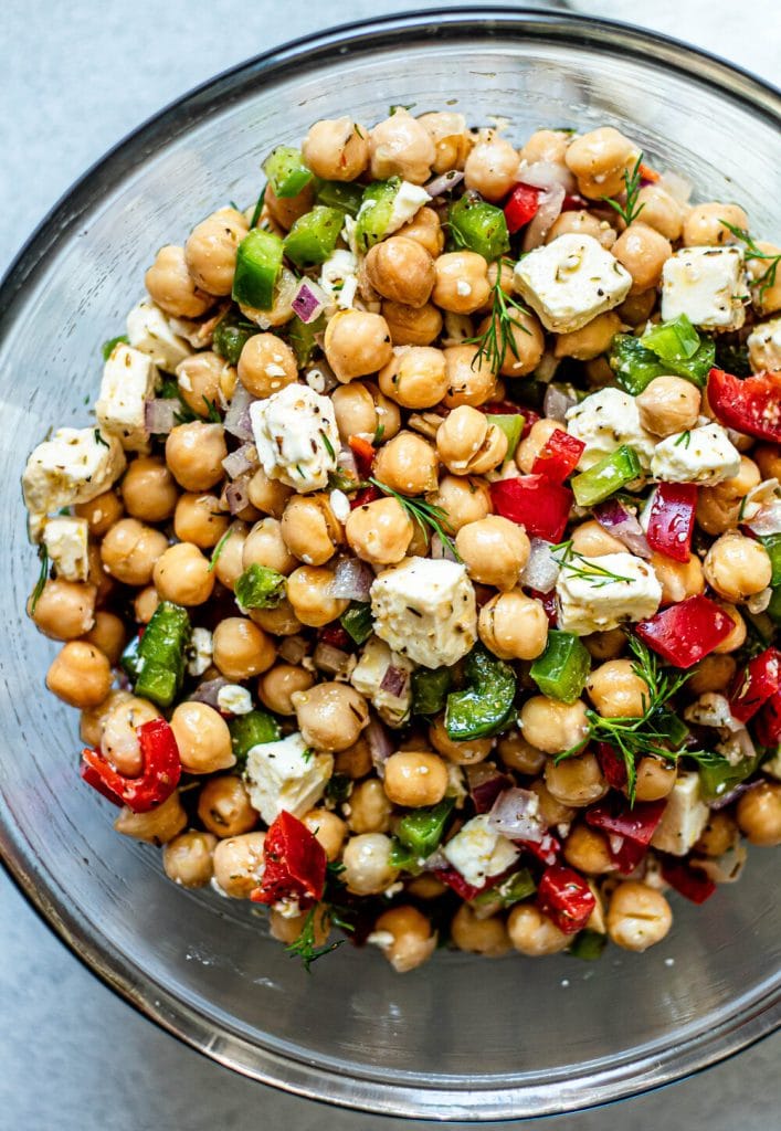 Greek Chickpea Salad in glass mixing bowl
