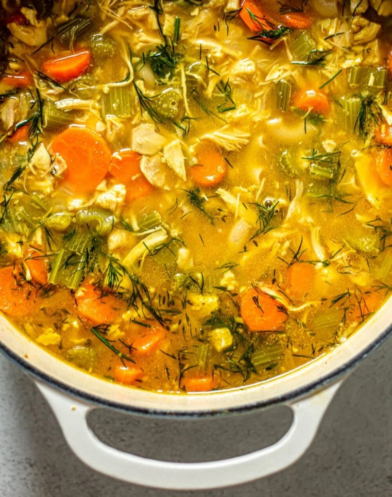 chicken noodle soup in cream dutch oven