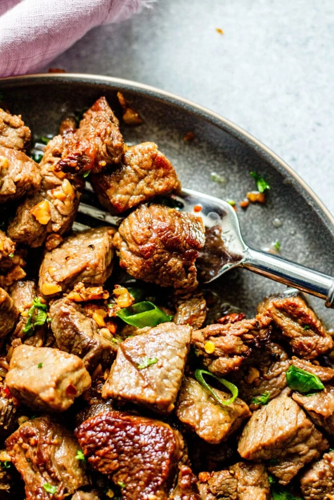 garlic butter steak bites on plate