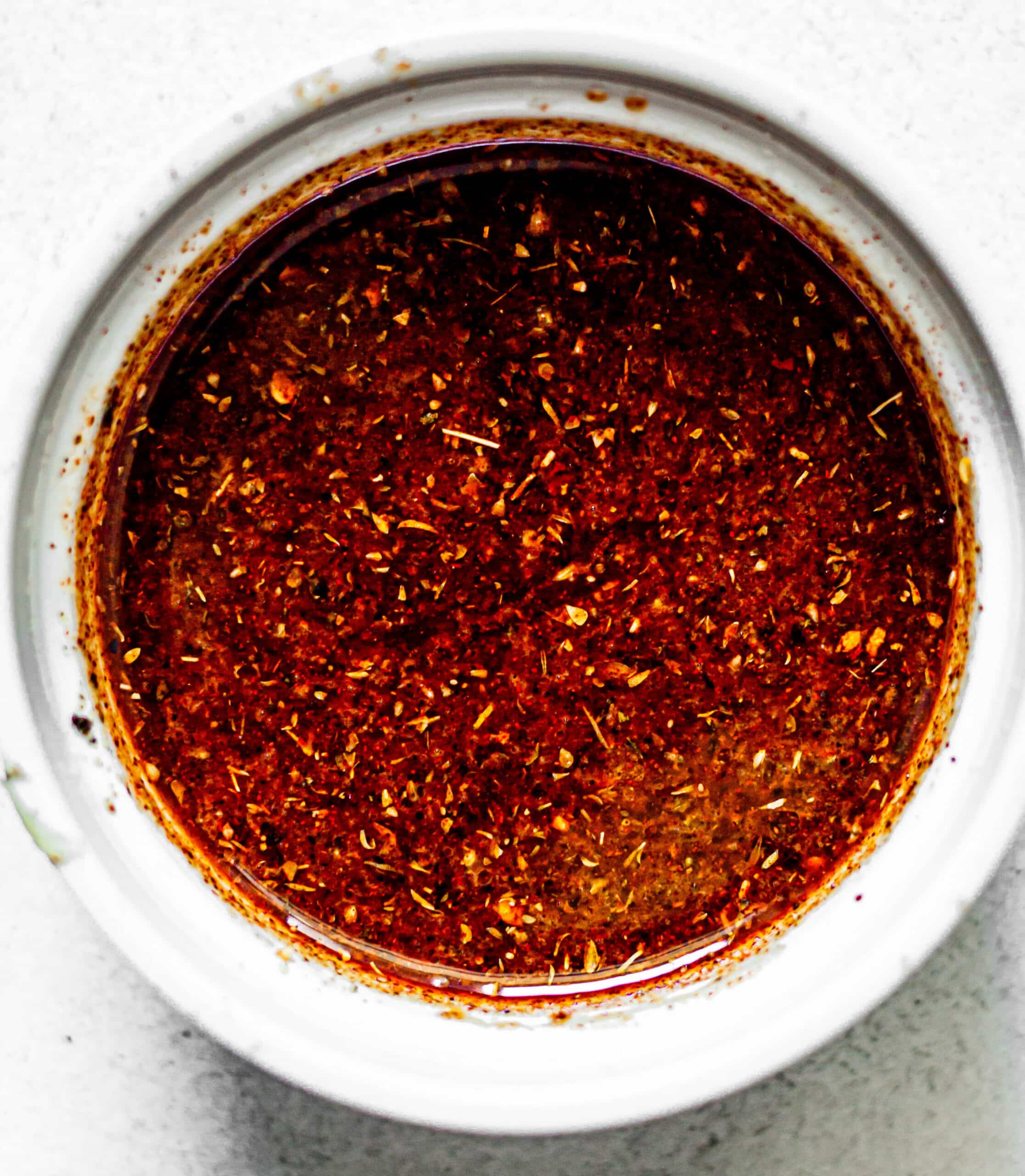 fajita marinade in white bowl