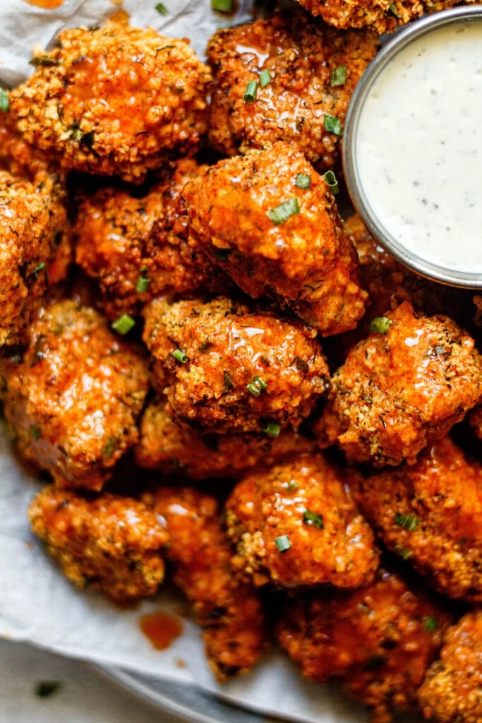 Buffalo Ranch Chicken Nuggets on plate with ranch dressing