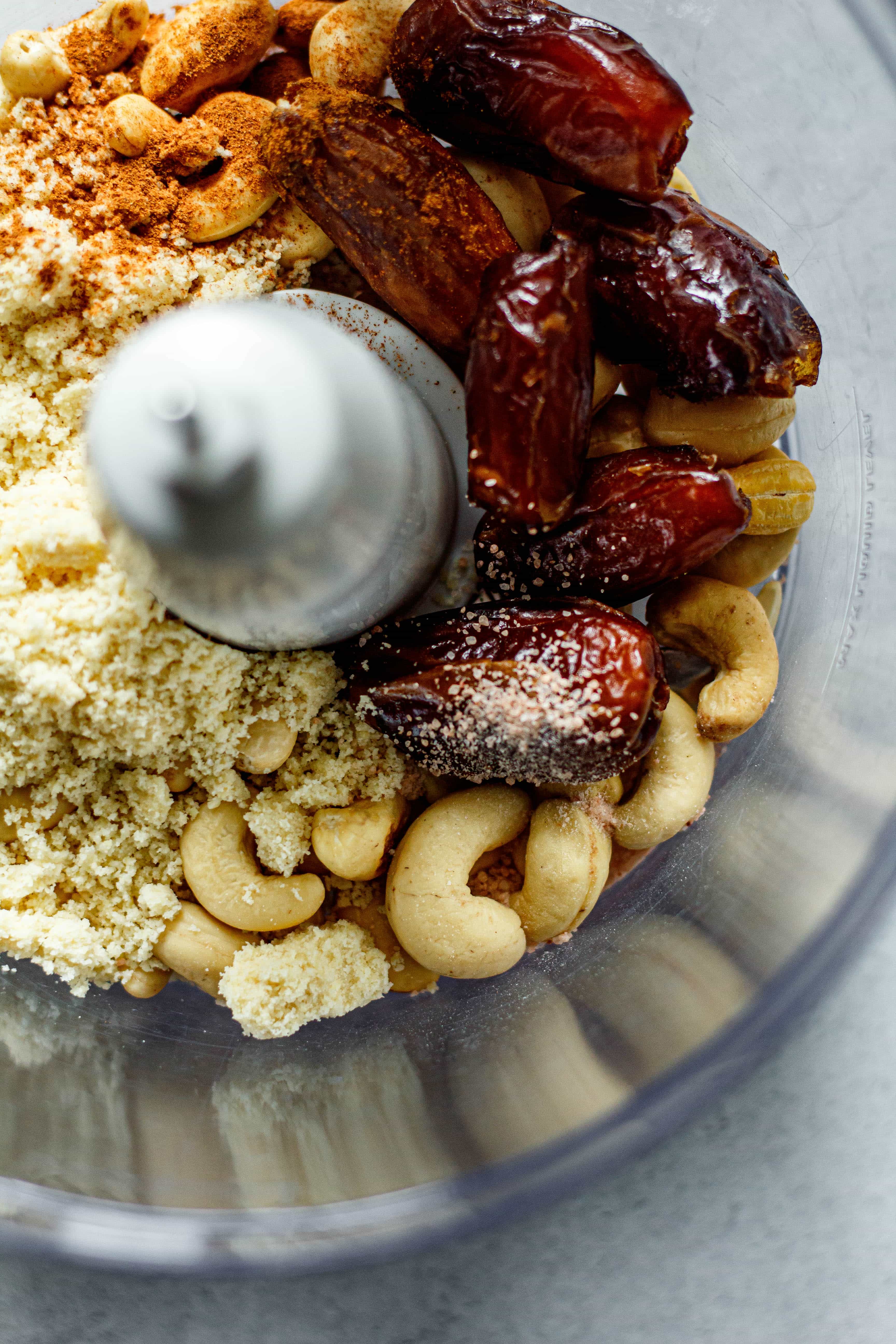 dates, almond flour, cashews, cinnamon, and salt in a food processor bowl