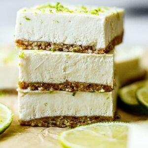 Healthy Key Lime Pie Bars stacked on top of each other