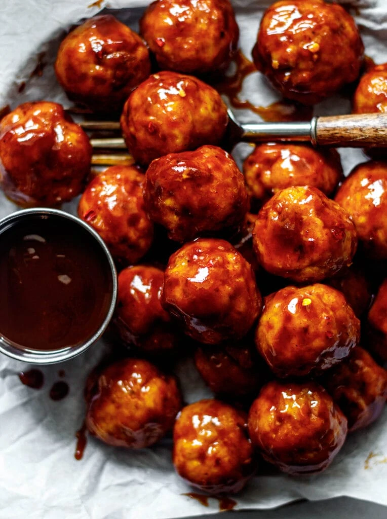 bbq chicken meatballs on a plate with a fork