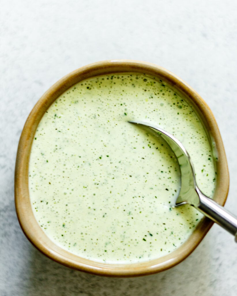 Greek yogurt jalapeño ranch in small bowl with spoon