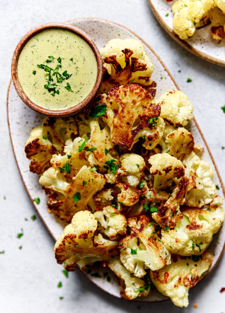 roasted cauliflower and tahini on plate