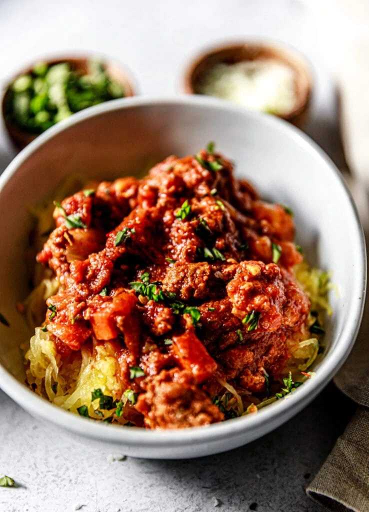 spaghetti squash bolognese in serving bowl