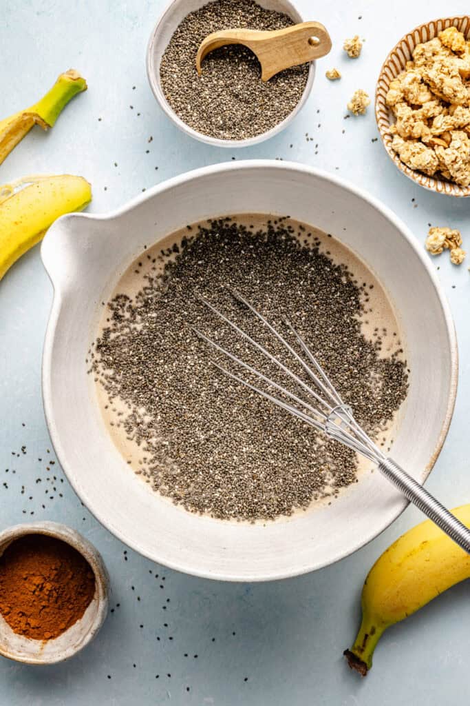 whisking chia seeds into pudding