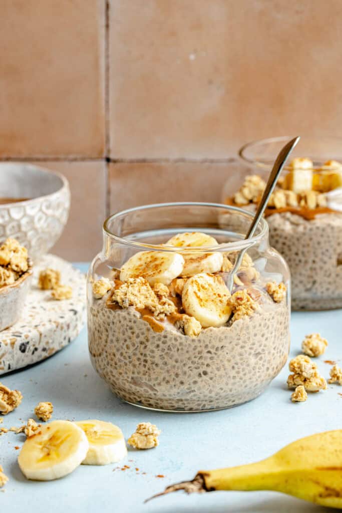 banana chia pudding in glass jar with spoon