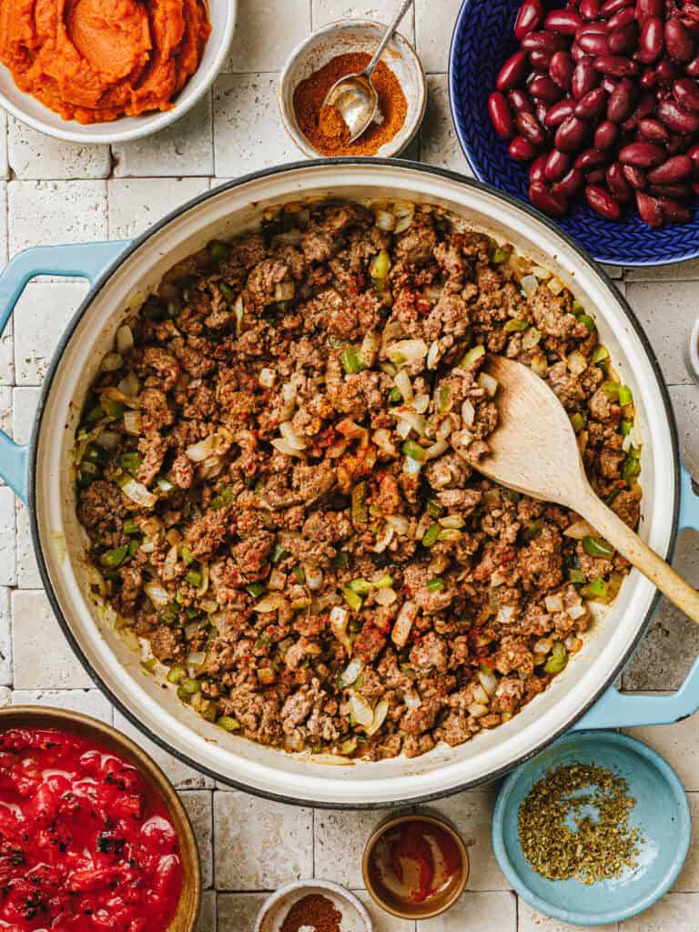 ground meat and spices being cooked in pot