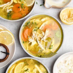 chicken soup in three bowls
