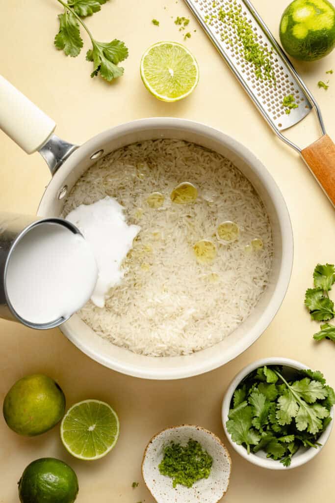 coconut being poured into pot