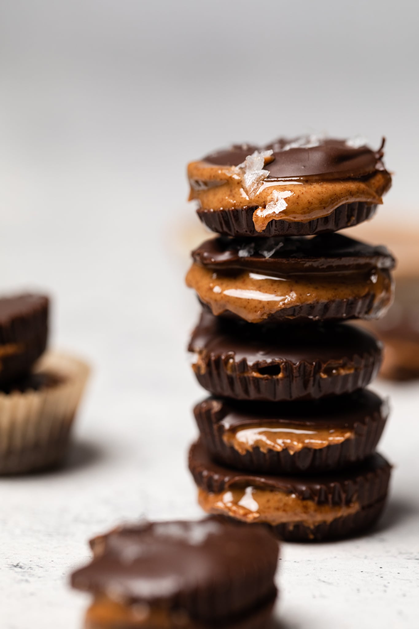 almond butter cups stacked on top of each other