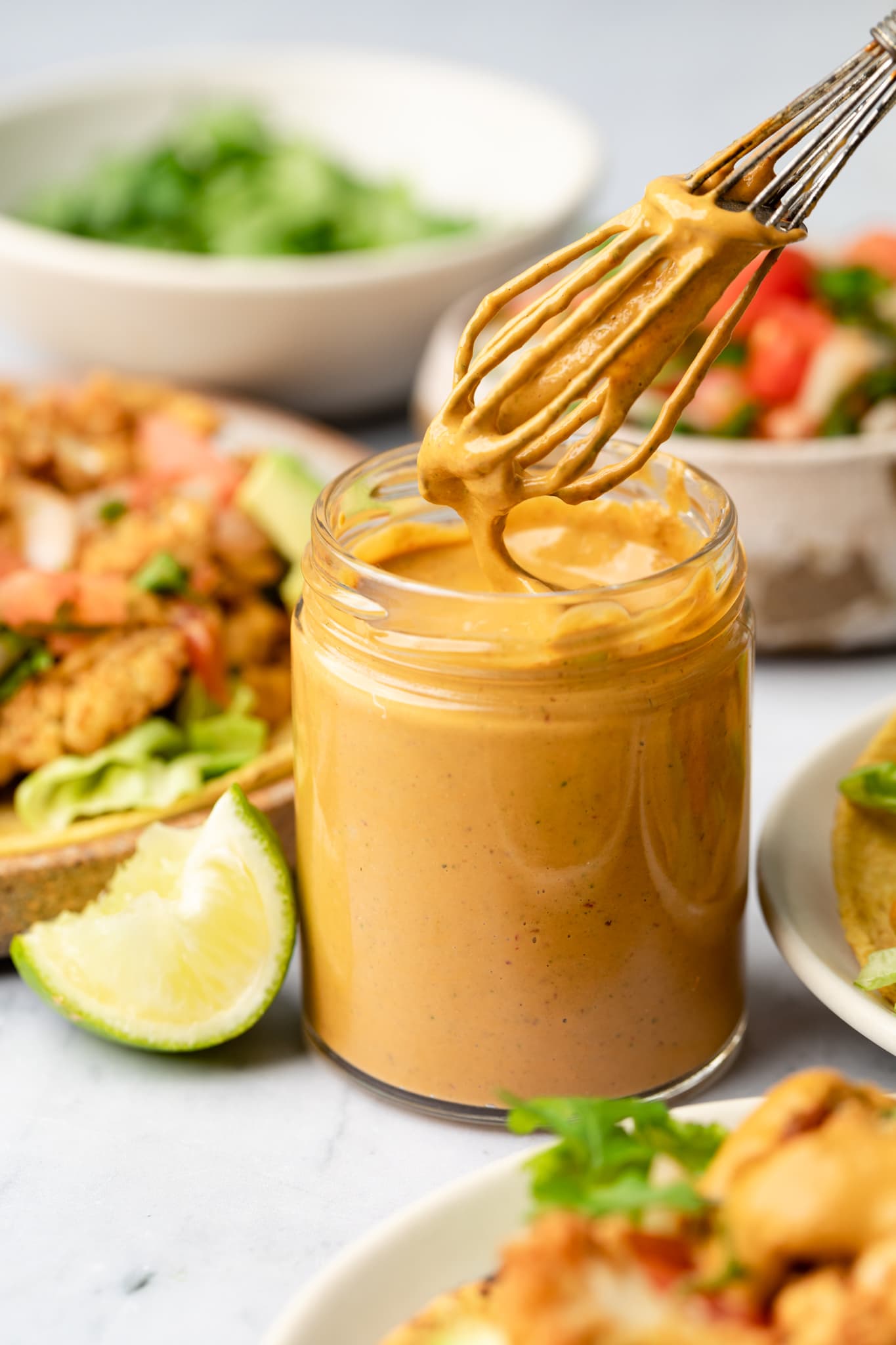 spicy lime tahini in small jar