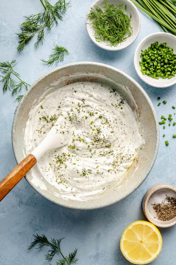 ranch dip being mixed in small bowl
