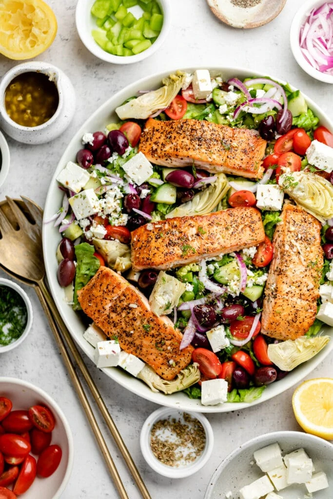 Greek salmon salad in large bowl