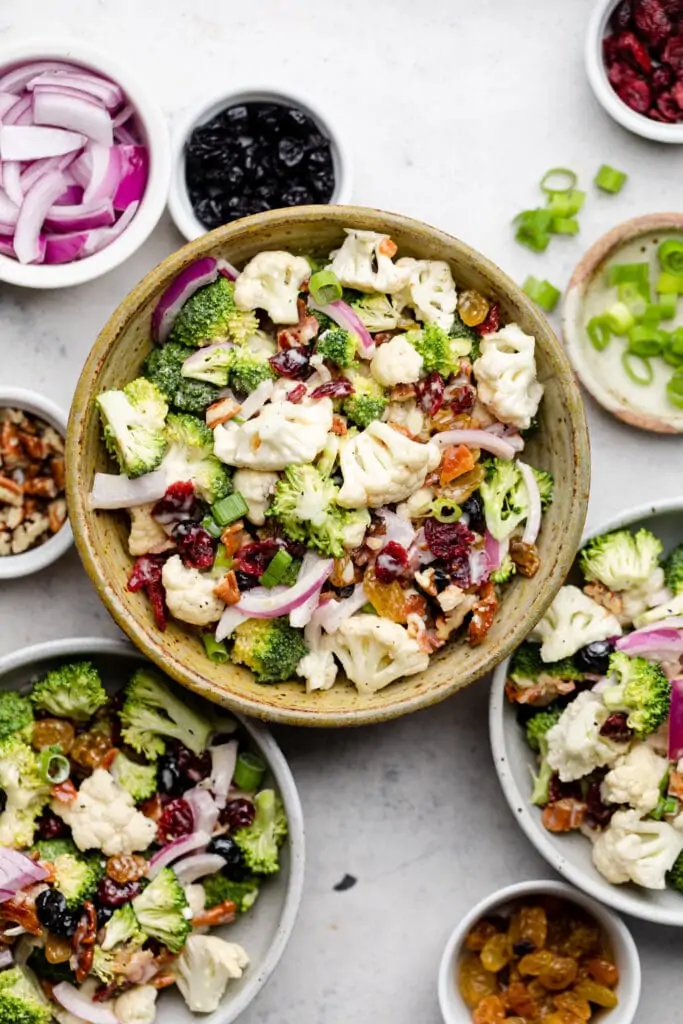 broccoli cauliflower salad in bowls