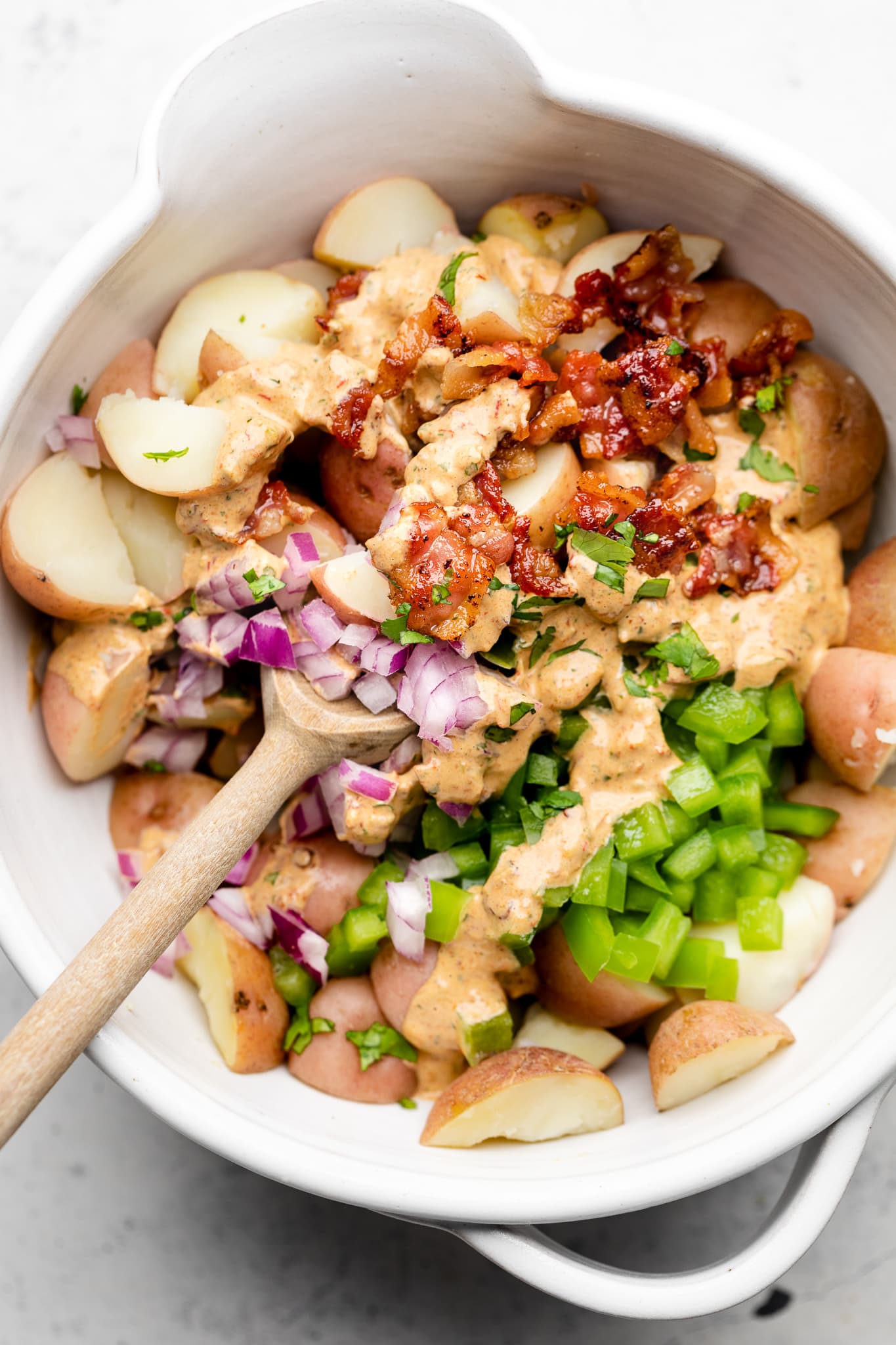 chipotle potato salad ingredients in a bowl