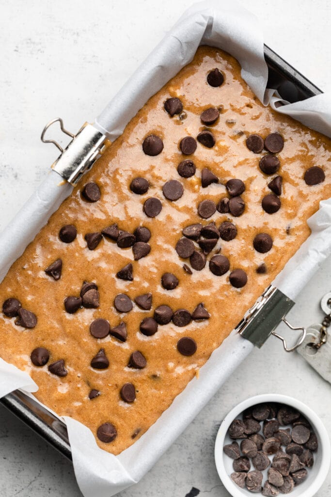 gluten free chocolate chip banana bread batter in loaf pan