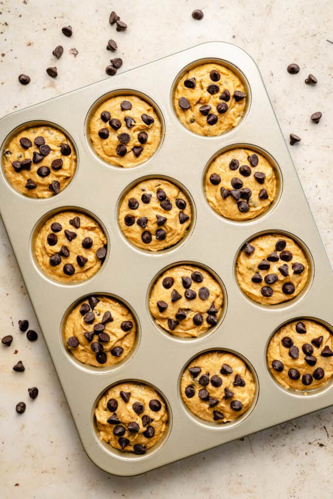 muffin batter in muffin tin