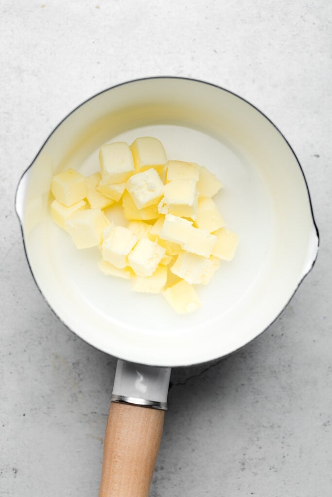 diced butter in pot