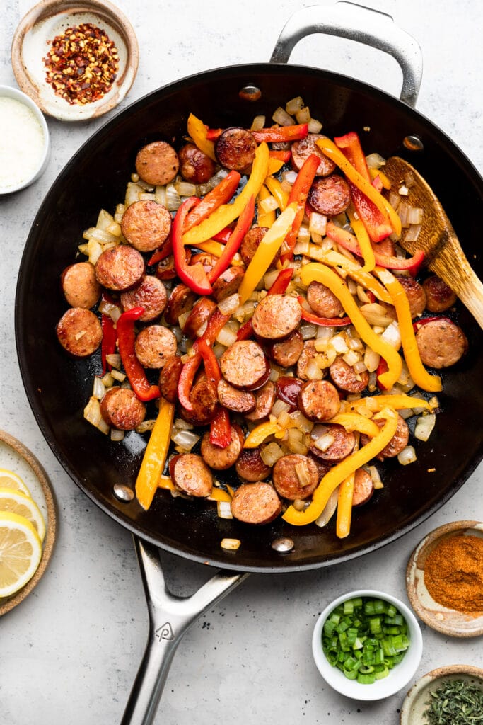 sausage, peppers, and onion in skillet