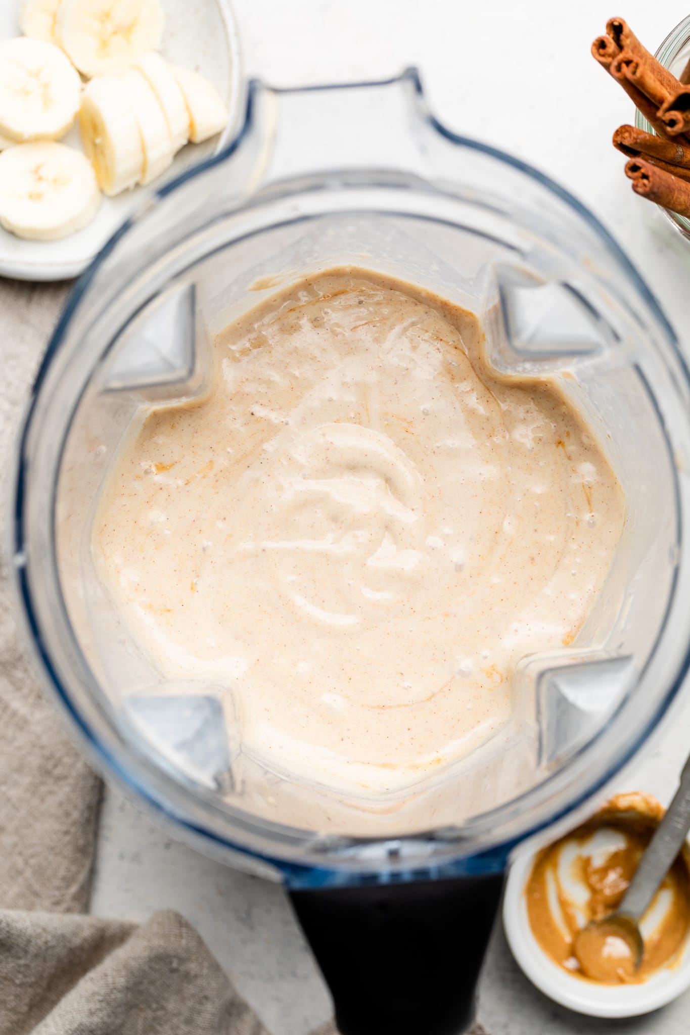 peanut butter banana smoothie combined in a blender