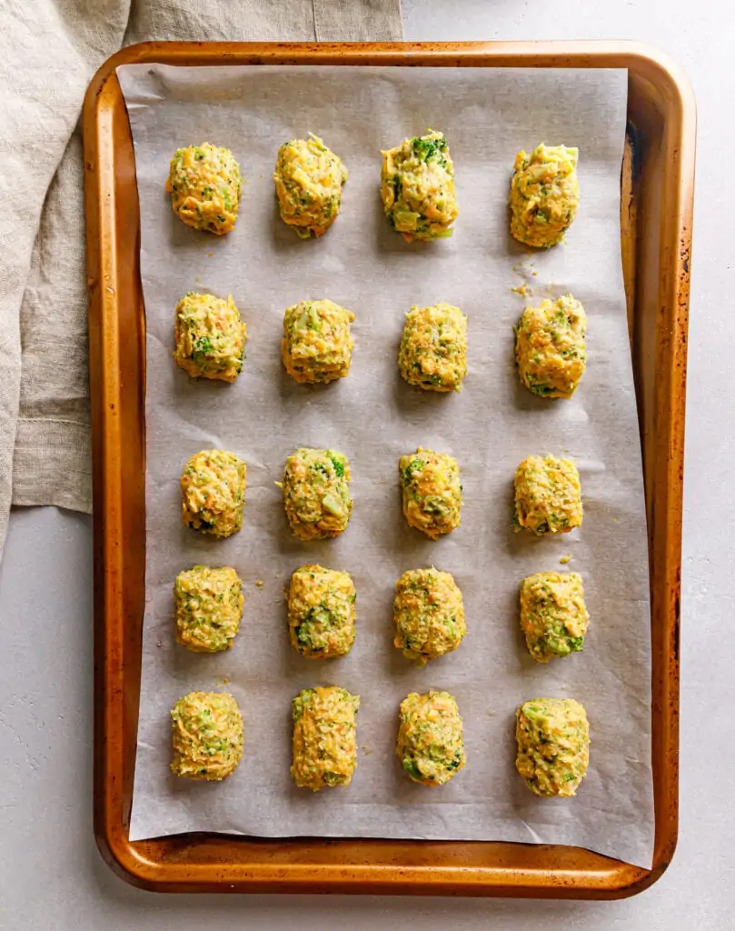 unbaked tots on sheet pan
