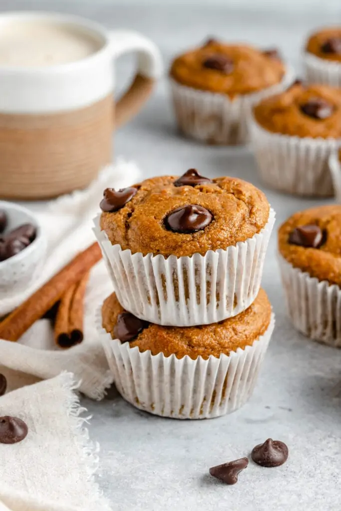 healthy pumpkin banana muffins stacked on each other
