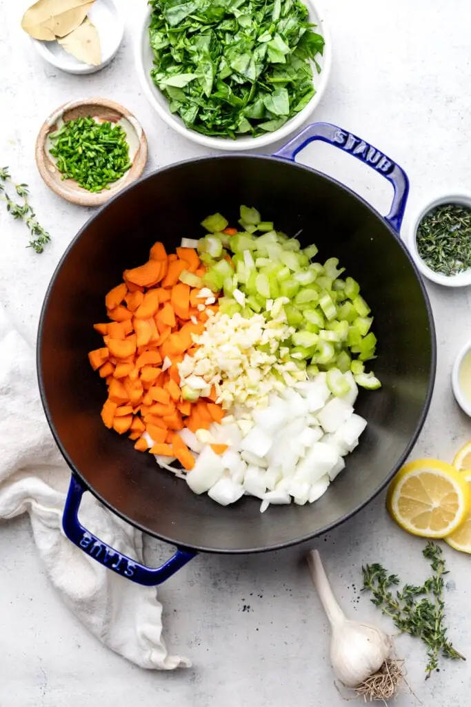 diced veggies in garlic in pot