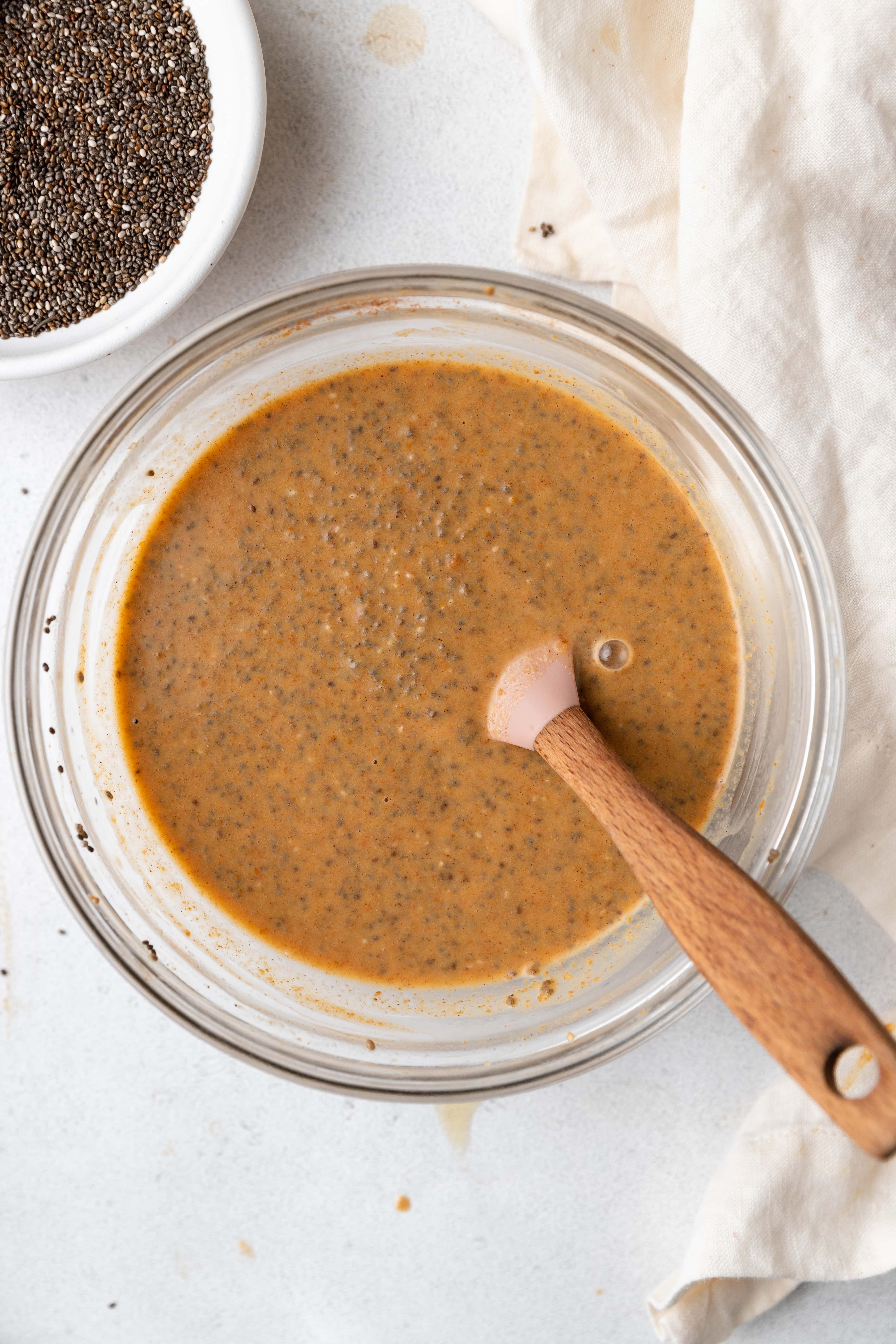 pumpkin chia seed pudding in mixing bowl