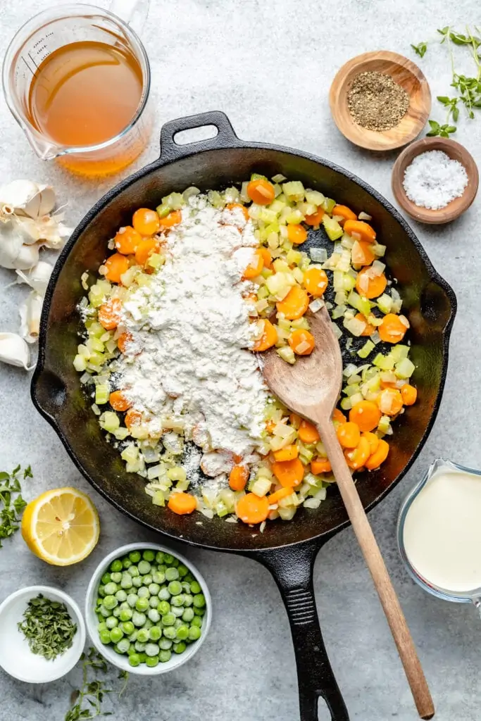 veggies and flour in pan