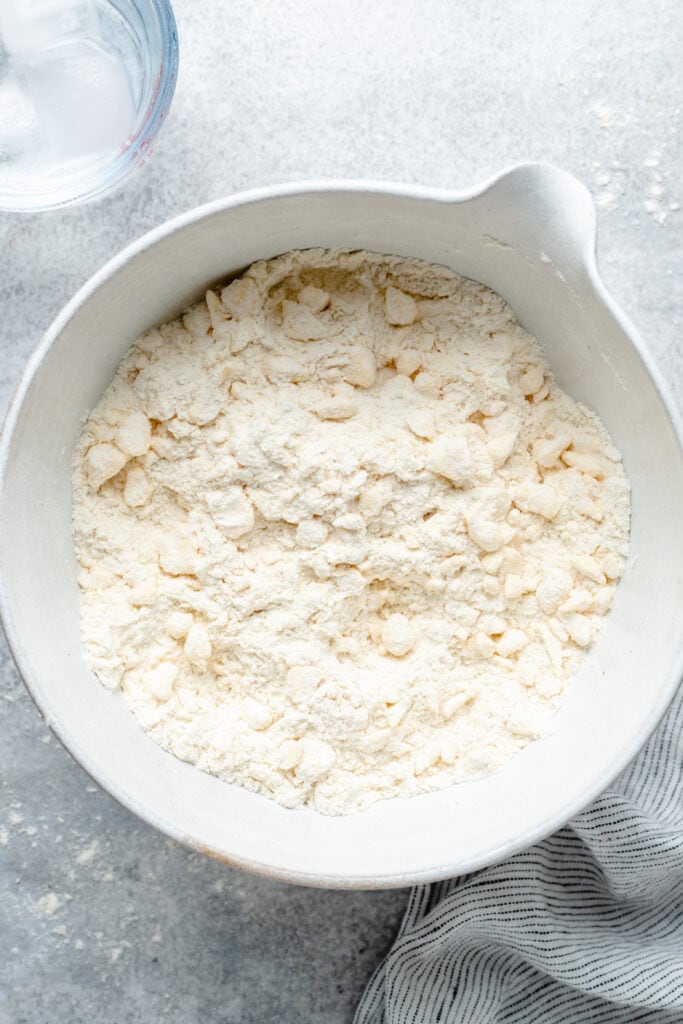 crumbled butter and flour in bowl