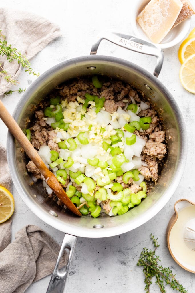 sausage, celery, onion, and garlic in pot
