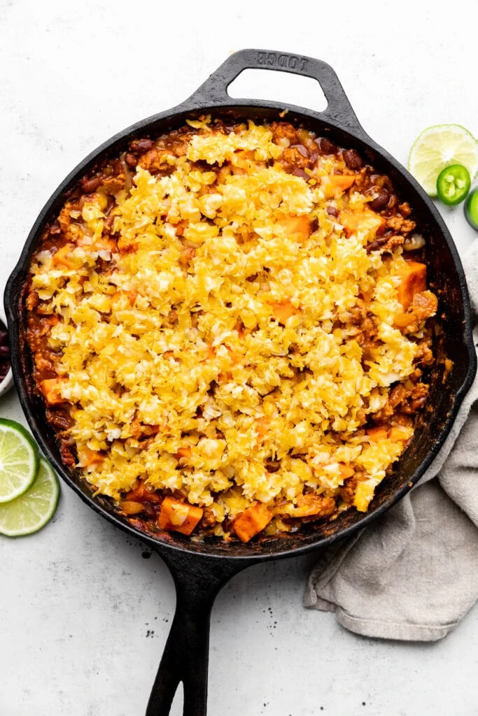 turkey enchilada skillet topped with cheese