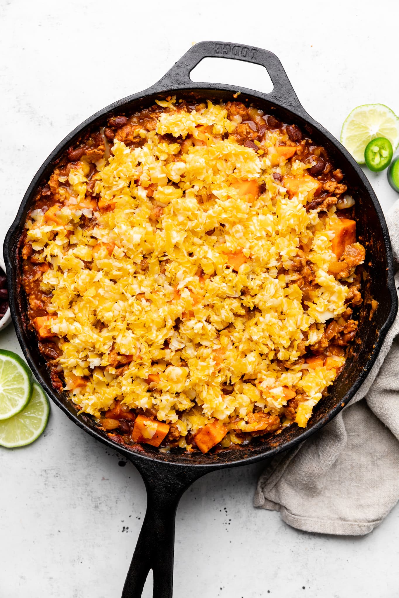 turkey enchilada skillet topped with cheese