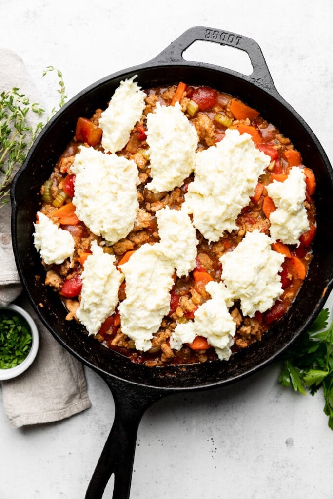 shepherds pie filling with mashed cauliflower on top